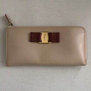 Salvatore Ferragamo Beige Wallet with Brown Bow and Gold Hardware